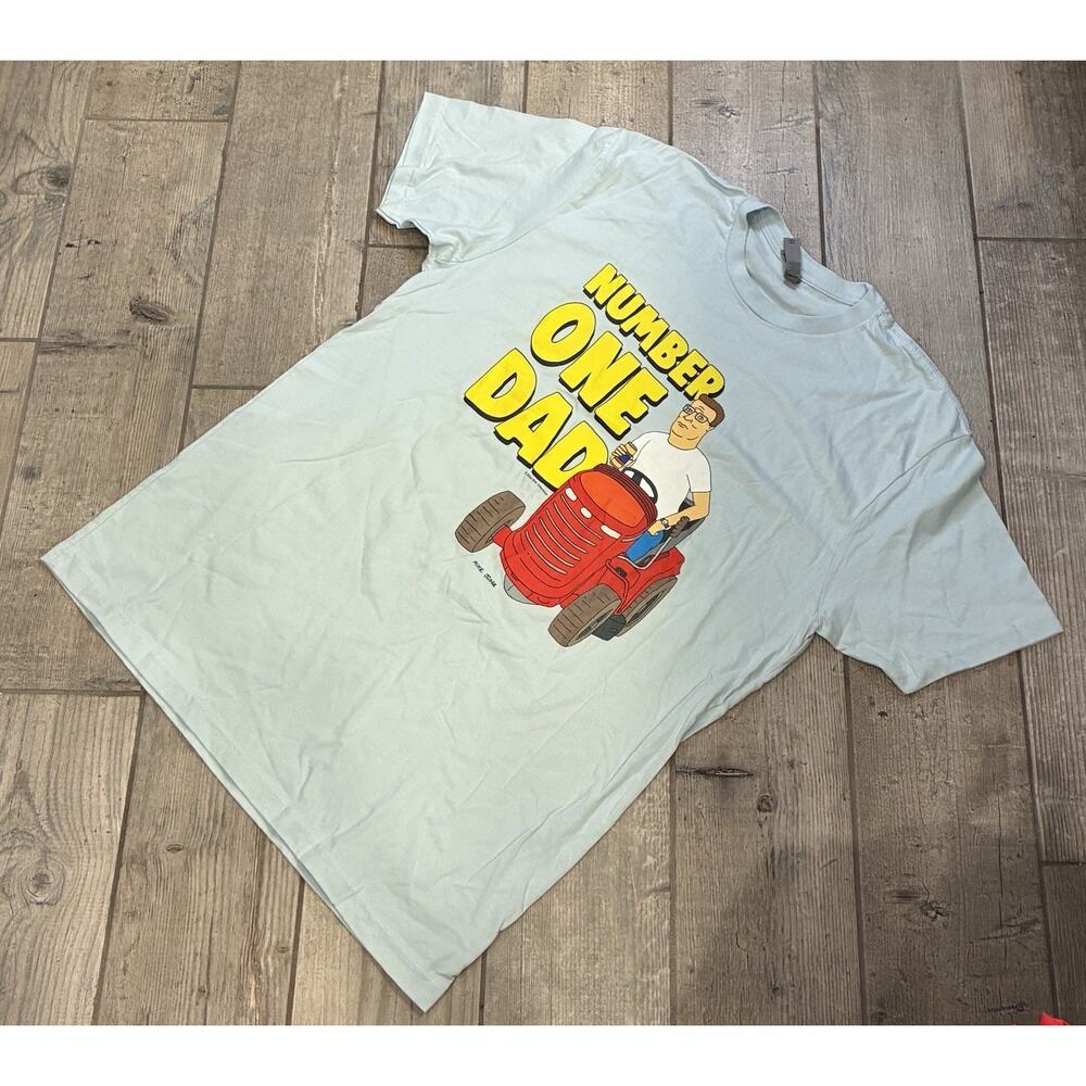 King of the Hill Number One Dad Hank Hill Graphic T-Shirt Light Blue Size Large